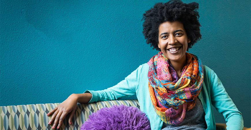 Alumna Kisha McGuire is a program counselor in the Fiat Lux Scholars Program within the campus’s Calvin E. Bright Success Center.