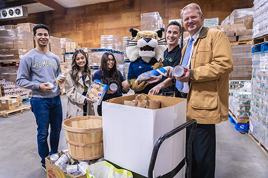 Rufus the Bobcat and students joined interim Chancellor Nathan Brostrom in delivering the food to the food bank earlier this week.